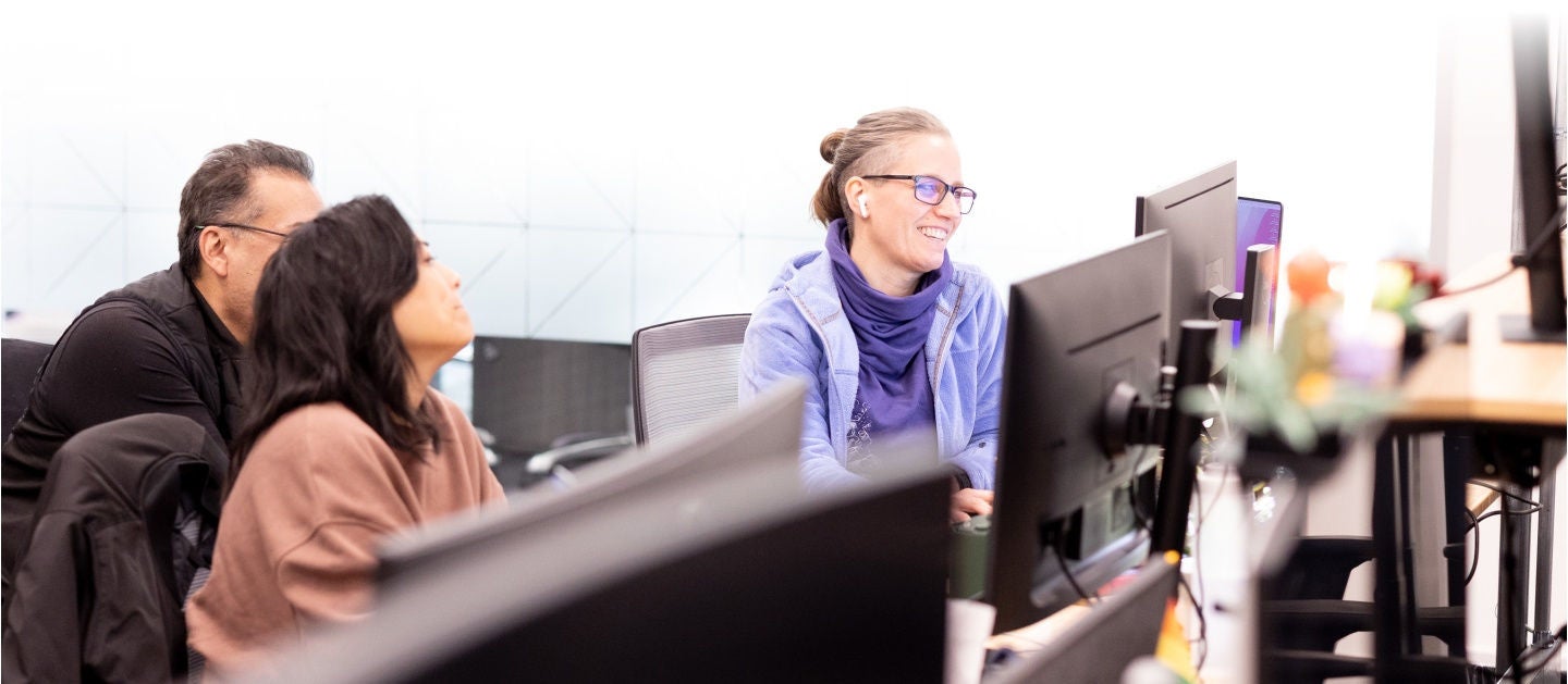 full-width-employees-discussing-project