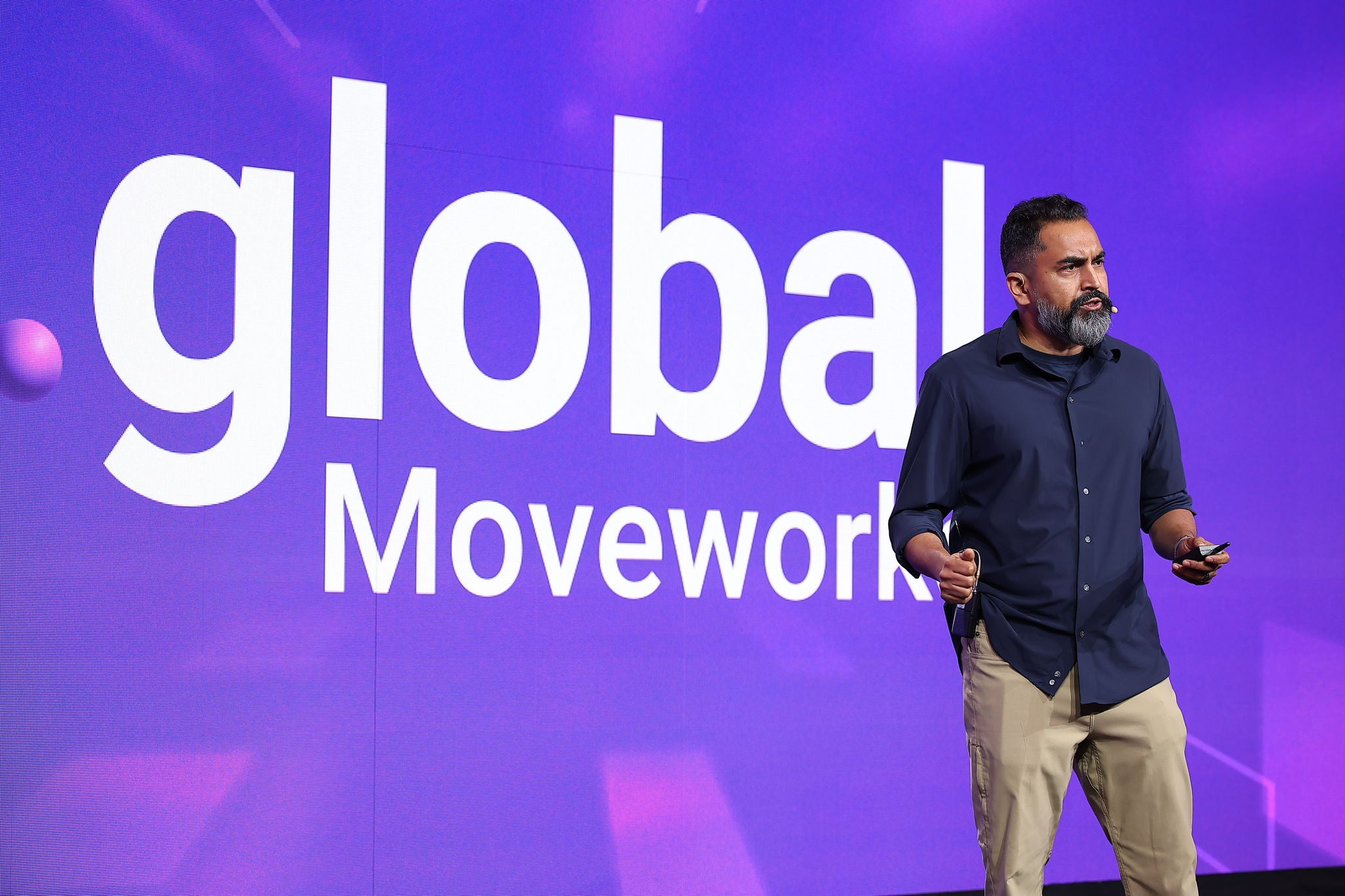 Roblox's Arvind KC presenting at Moveworks.global 2024.